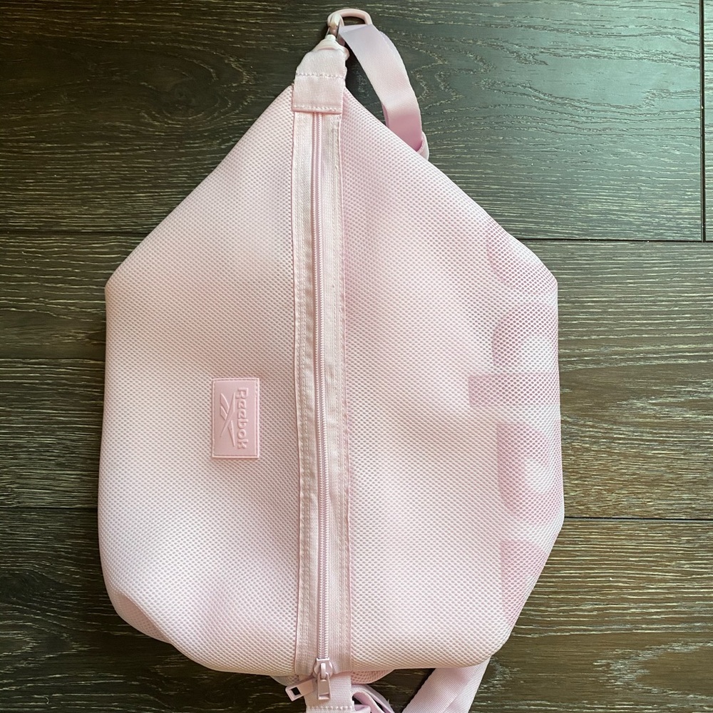 Pink Reebok backpack/crossbody